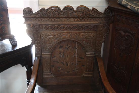 A 17th century oak Wainscot chair, W.2ft 2in. H.3ft 8in. incorporating later timbers